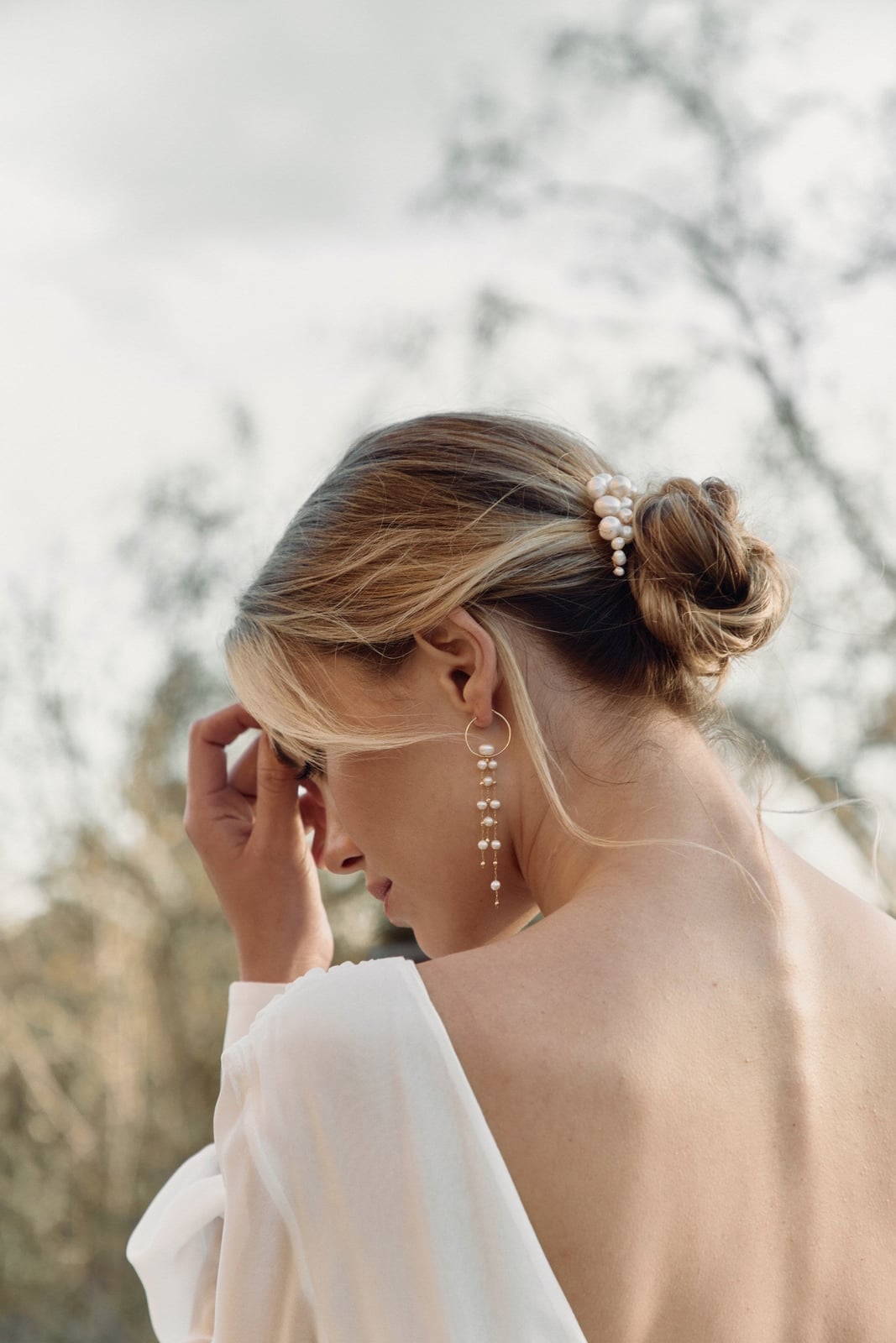 Blonde Balayage Low Bun With Braids — Simple Low Bun Wedding Hair