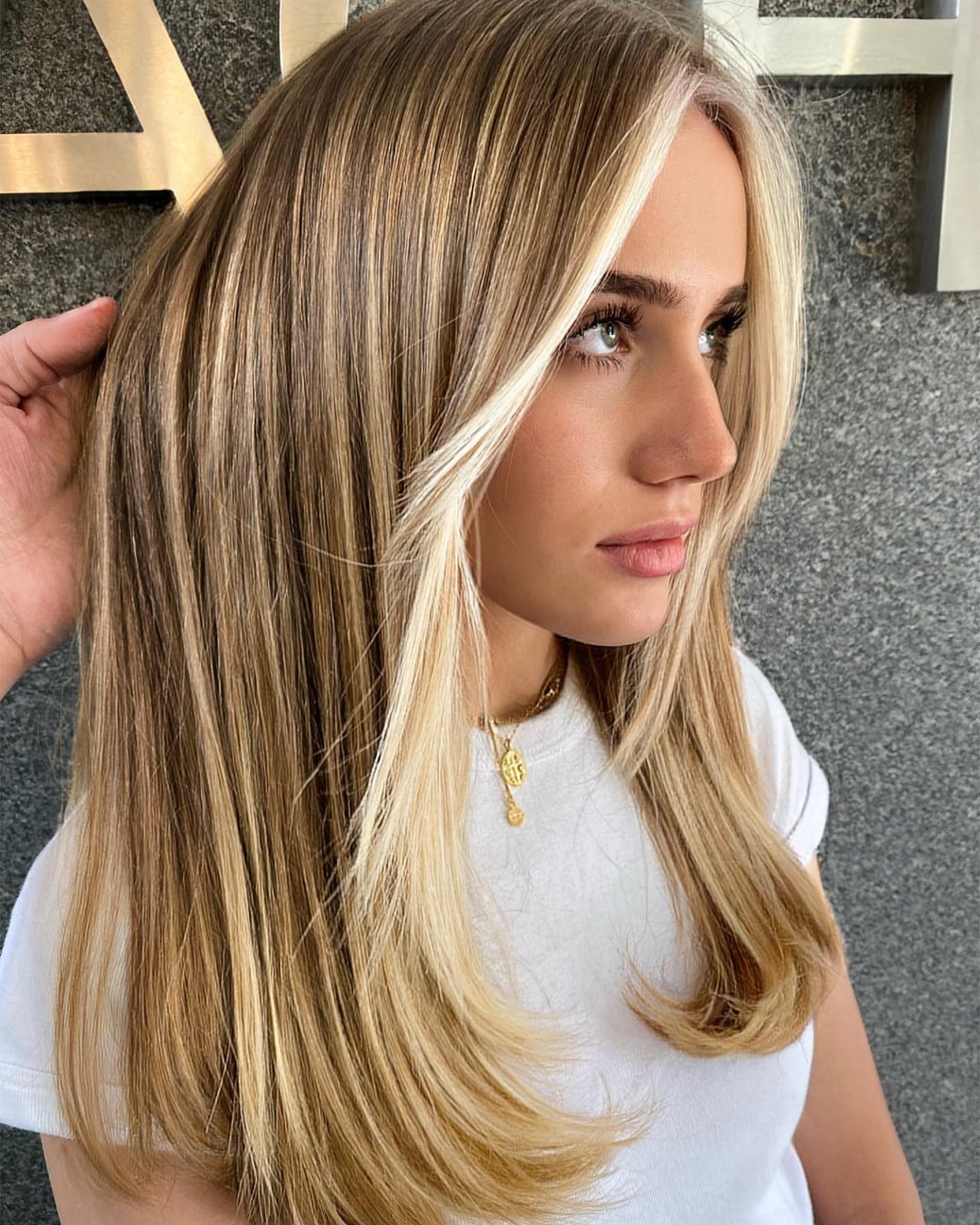 Simple white t-shirt elevated by blonde money pieces and gold necklace — Simple Money Piece