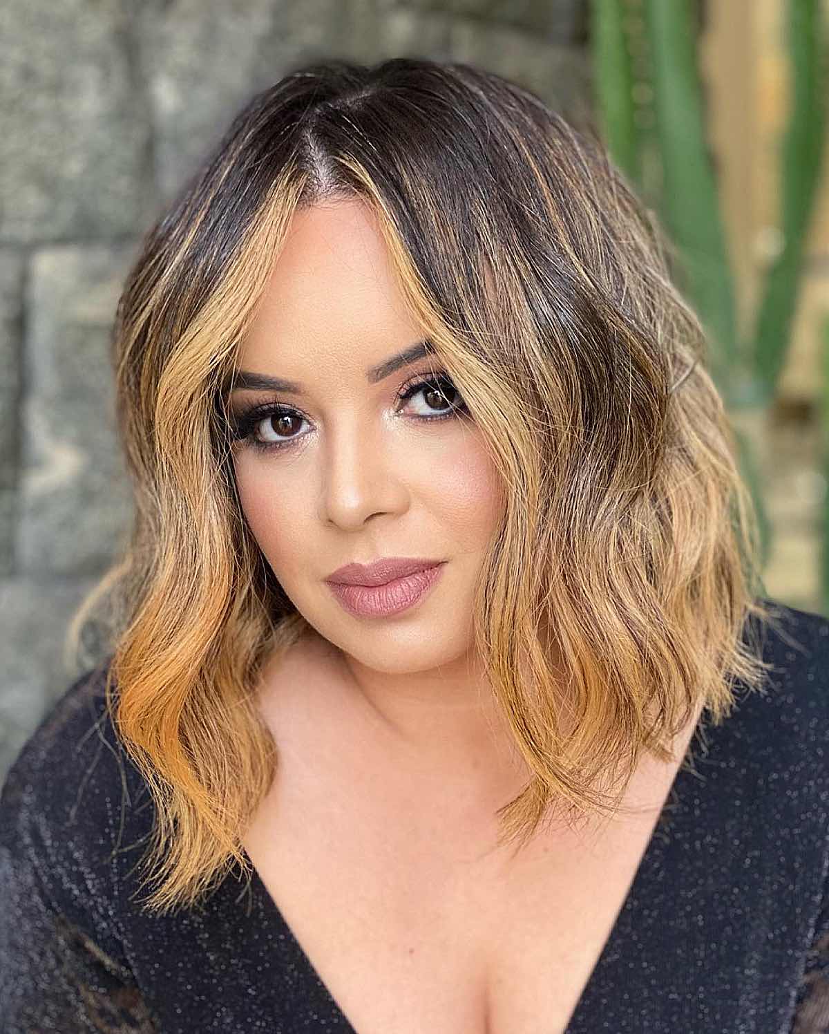 Sparkly black top complements blonde money pieces in a casual setting — Simple Money Piece