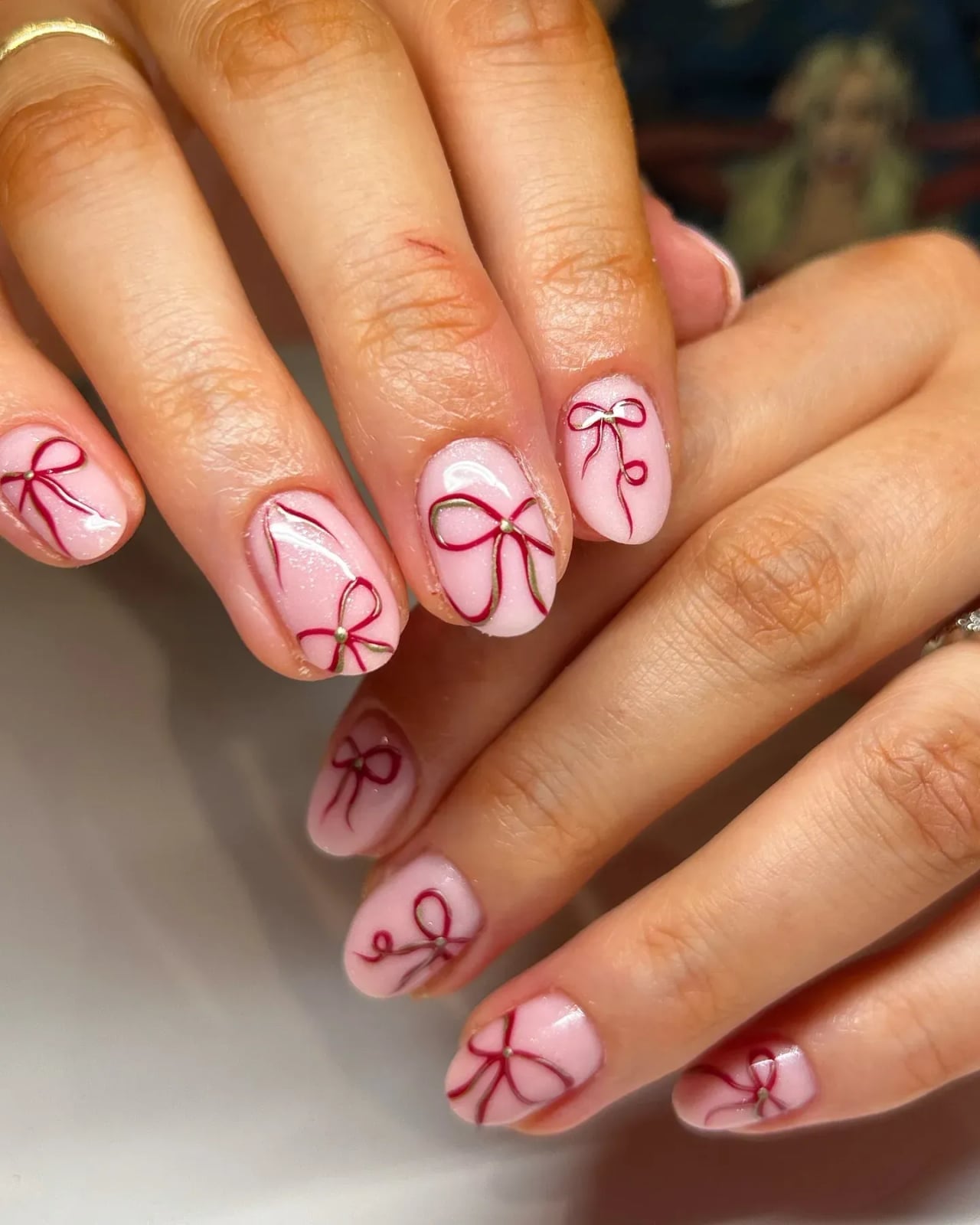 Dark Red Bow Accent Short Oval Nails — Simple Nail Art