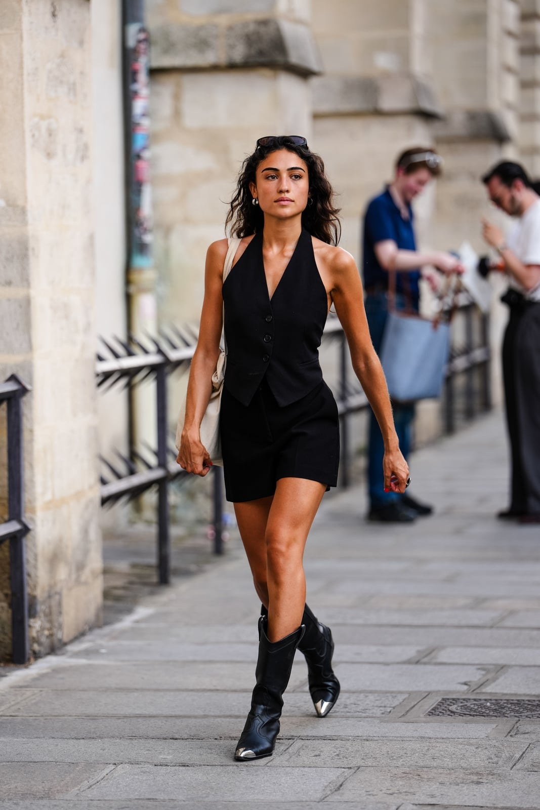 Black Vest Shorts and Silver-Tipped Cowboy Boots — Simple Outfits with Cowboy Boots