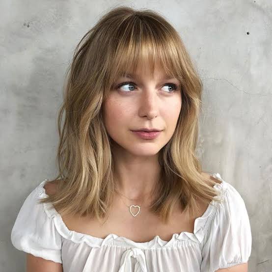 Collarbone Shag With Curtain Bangs — Simple Oval Face Haircuts