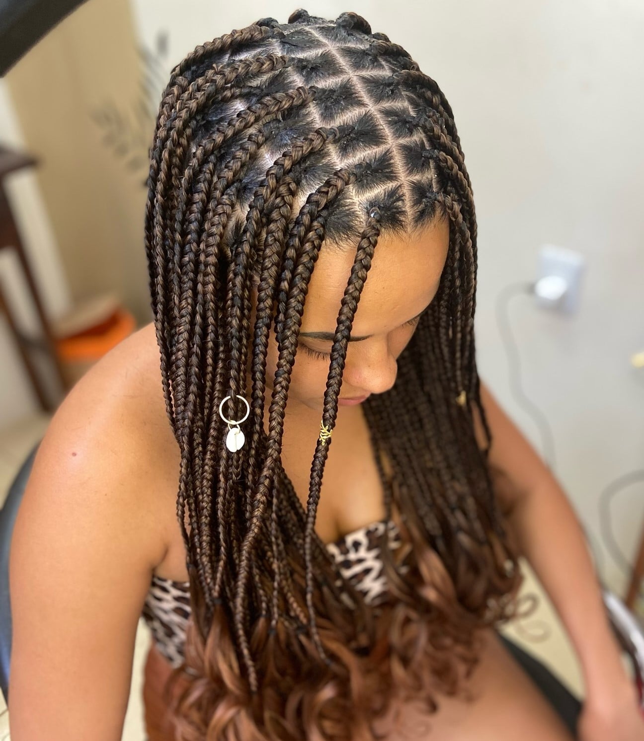 Dark Brown Box Braids With Rings Mid Back, Wavy Ends Dark Brown Box Braids With Rings Mid Back, Wavy Ends — Simple Parting Braids