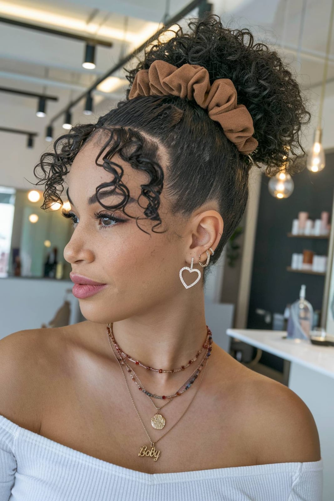 High Afro Puff With Curly Bangs High Afro Puff With Curly Bangs — Simple Puff Hairstyles