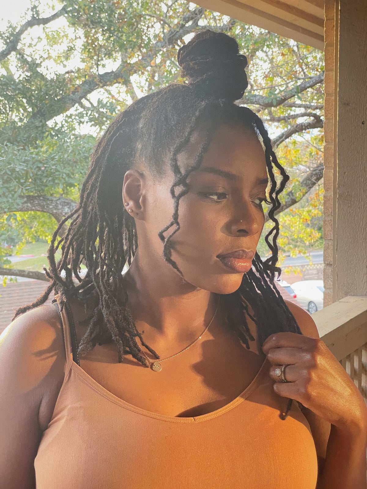 Top Knot With Loose Coily Locs — Simple Retwist Locs