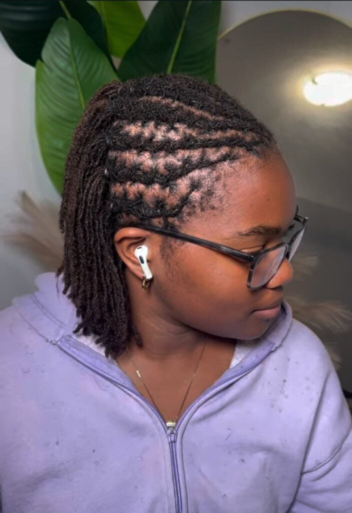 Neat Dark Brown Locs Ponytail Side View — Simple Retwist Locs