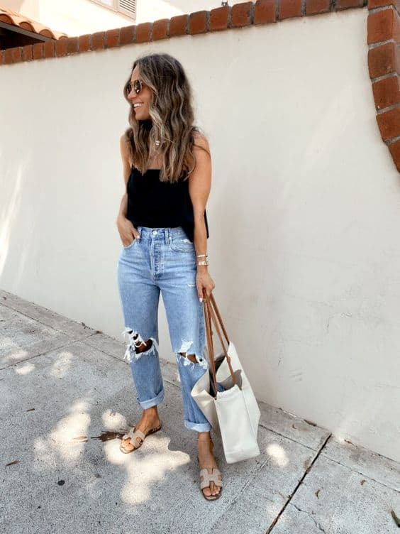 Heavily Ripped Jeans With Black Tank Top And Slide Sandals — Simple Ripped Jeans Outfits
