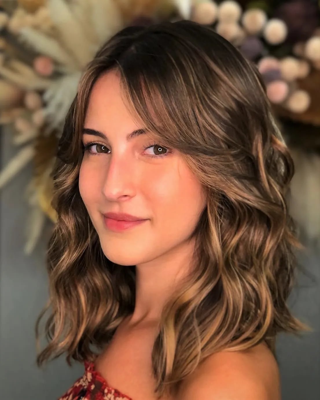 Wavy Shoulder Layers With Tousled Bangs — Simple Side Bangs