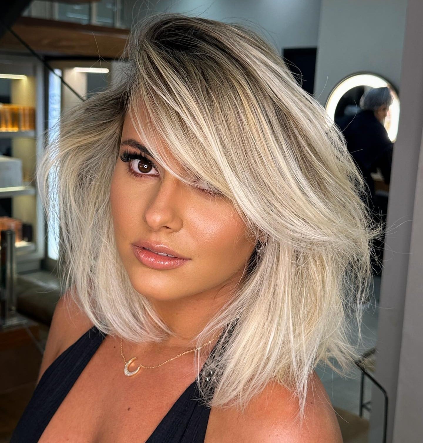 Ash Blonde Collarbone Lob With Dark Roots Ash Blonde Collarbone Lob With Dark Roots — Simple Side Part Bangs