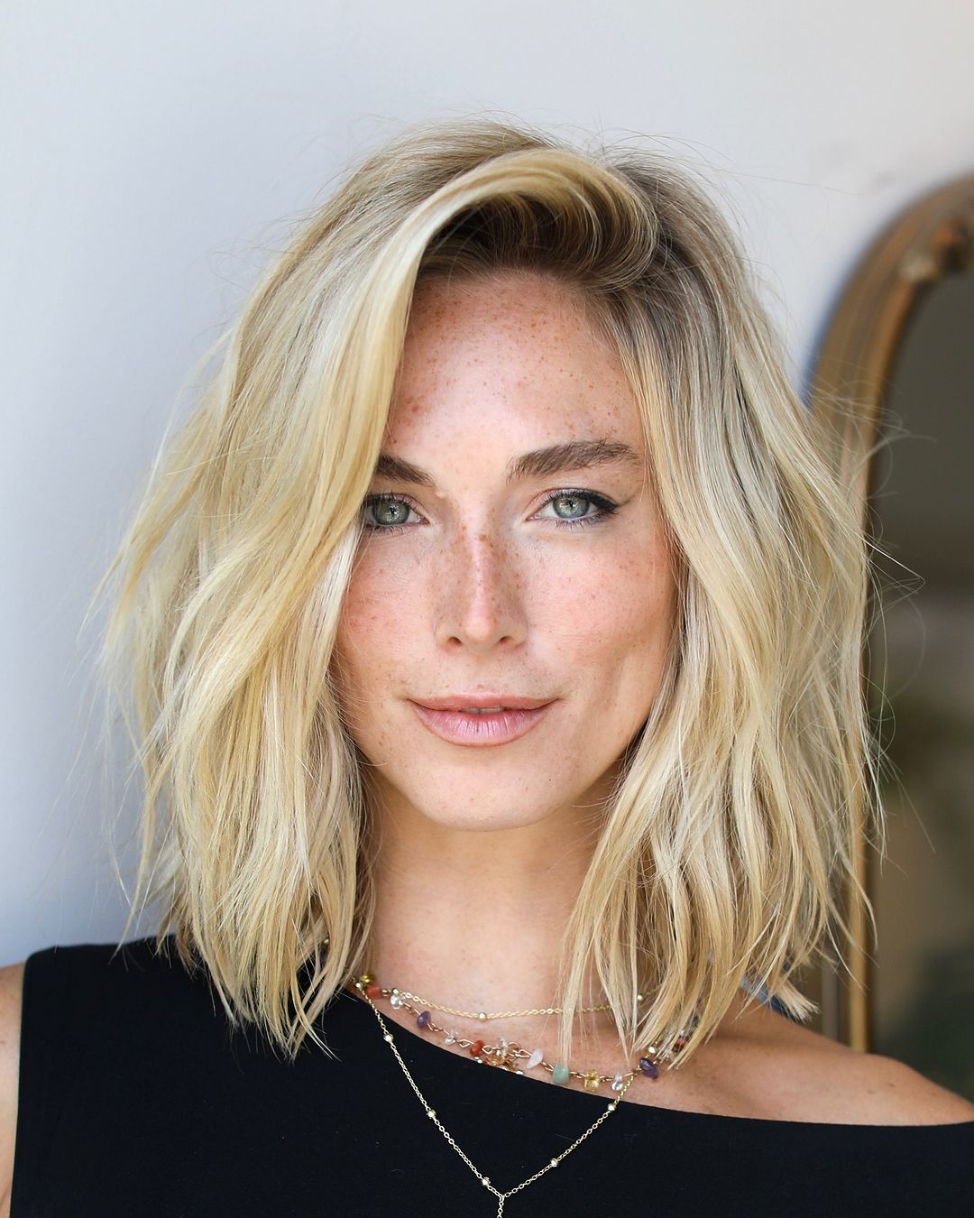 Collarbone Blonde With Face-Framing Layers — Simple Side Part Hairstyles