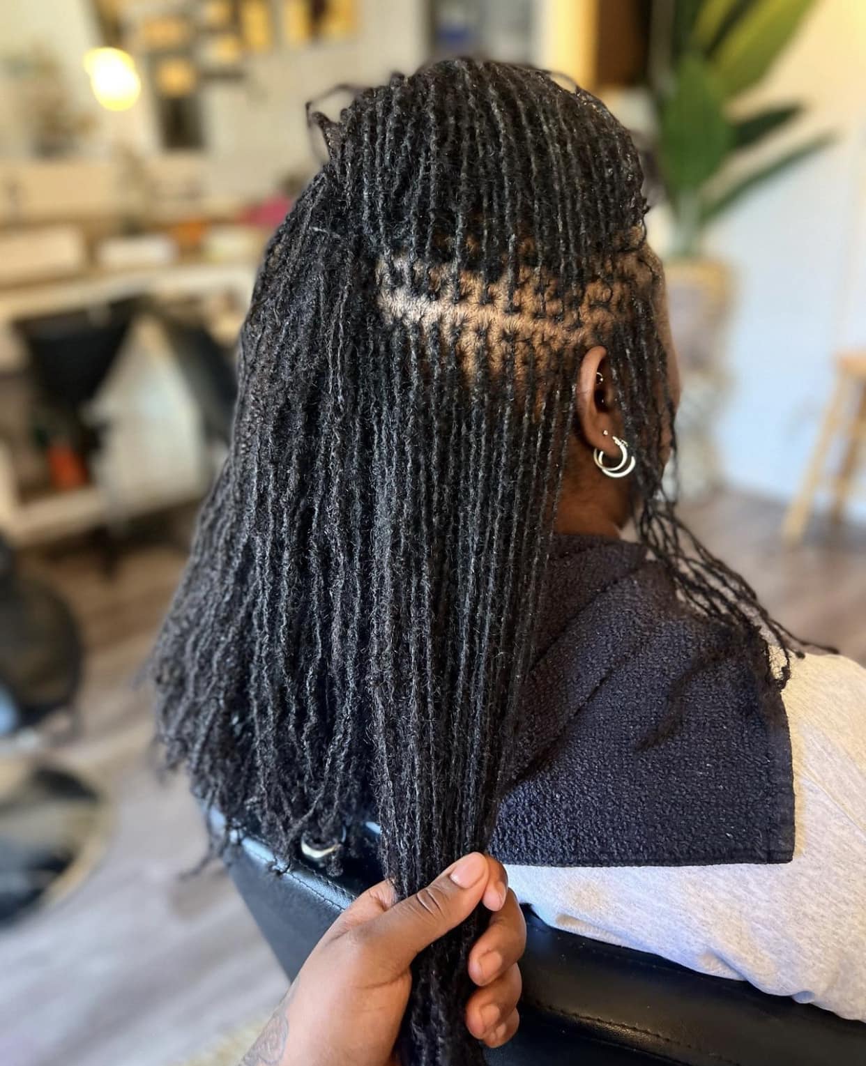 Mid-Back Black Coily Micro Locs Half Up Half Down — Simple Sister Locs
