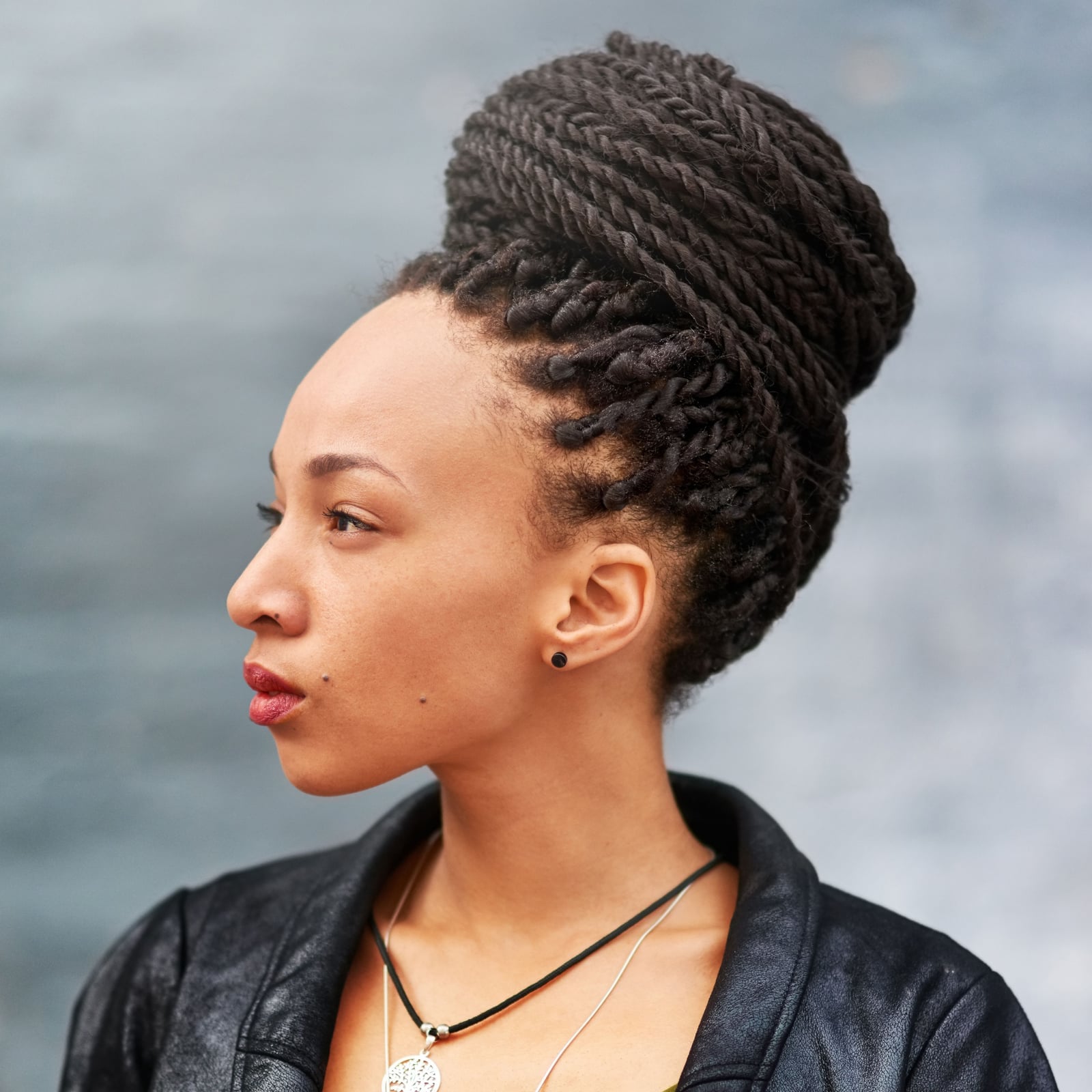 Dark Brown Coily Hair In A High Bun — Simple Twist Hairstyles