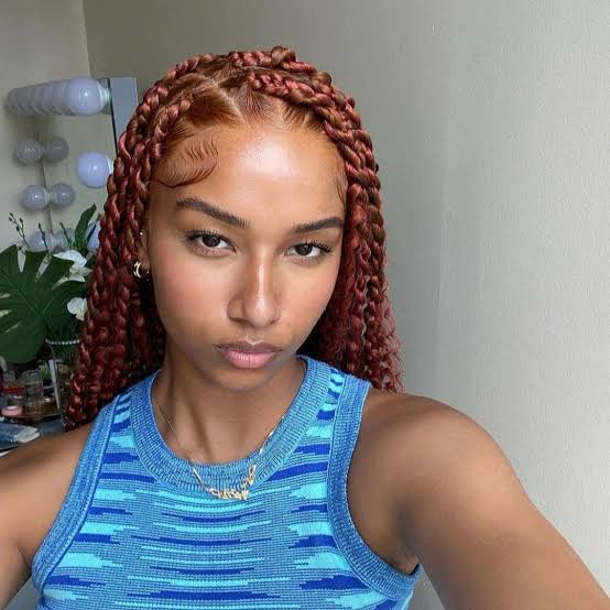 High Bun With Loose Twists And Geometric Parting — Simple Twisted Styles