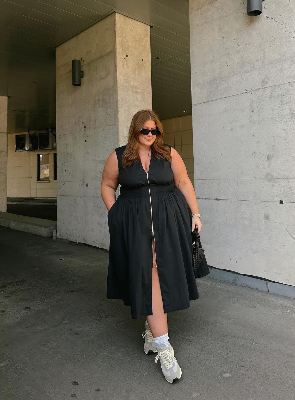 Black sleeveless V-neck dress with front zipper Black sleeveless V-neck dress with front zipper — Simple Up Dress
