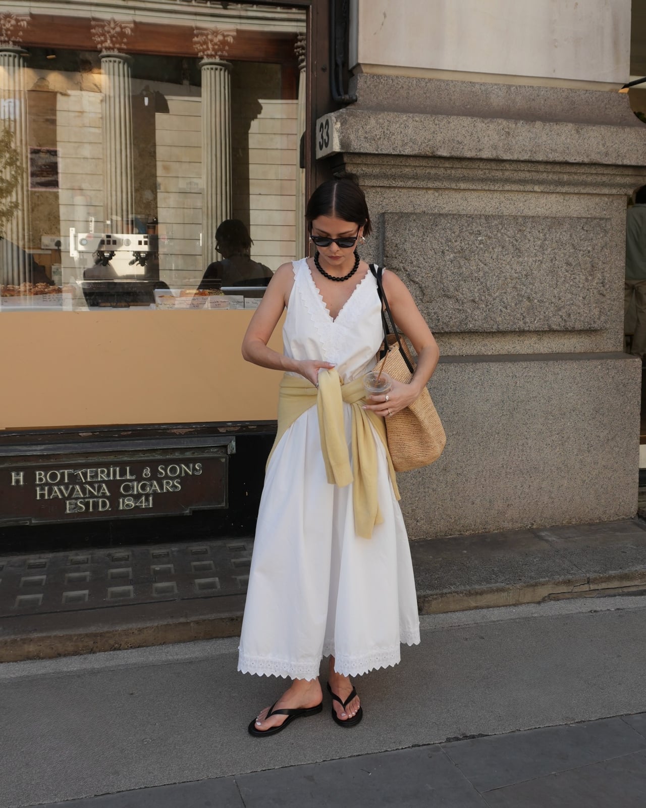 White midi dress with lace trim and tied sweater, Black Flip-Flops White midi dress with lace trim and tied sweater, Black Flip-Flops — Simple Up Dress