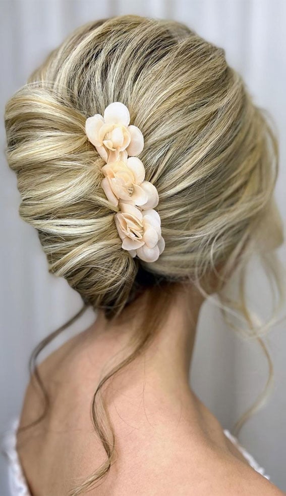 Polished Blonde Updo With Floral Accessory Polished Blonde Updo With Floral Accessory — Simple Updo Hair