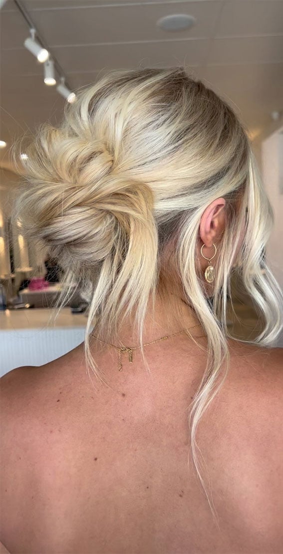 High Tousled Messy Bun With Face-Framing Pieces High Tousled Messy Bun With Face-Framing Pieces — Simple Updo Hair