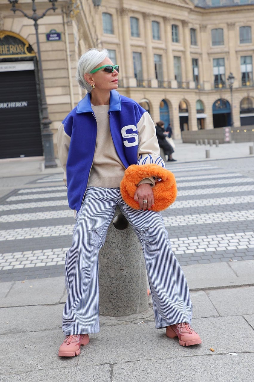 Blue Varsity Jacket With Striped Trousers — Simple Varsity Jacket Outfits