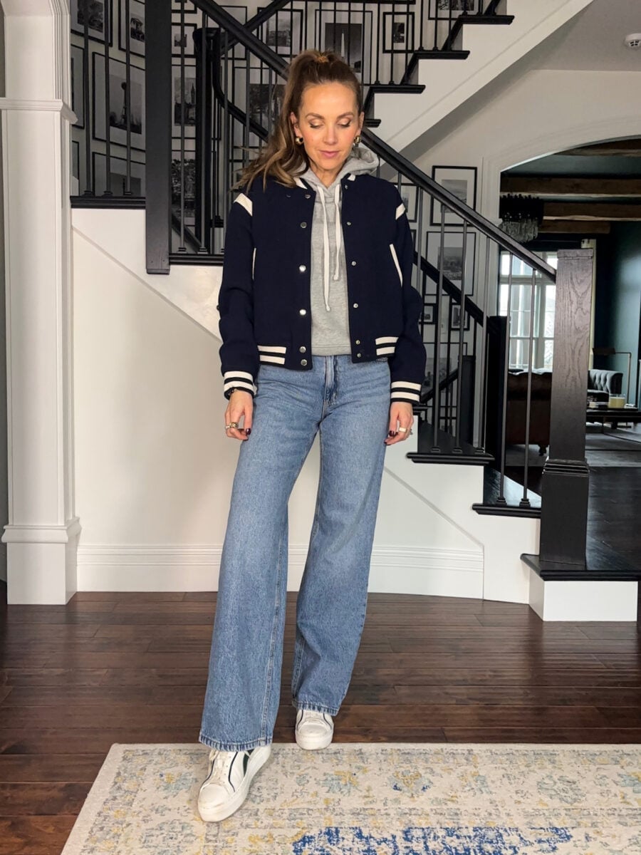 Navy Varsity Jacket Over Gray Hoodie — Simple Varsity Jacket Outfits