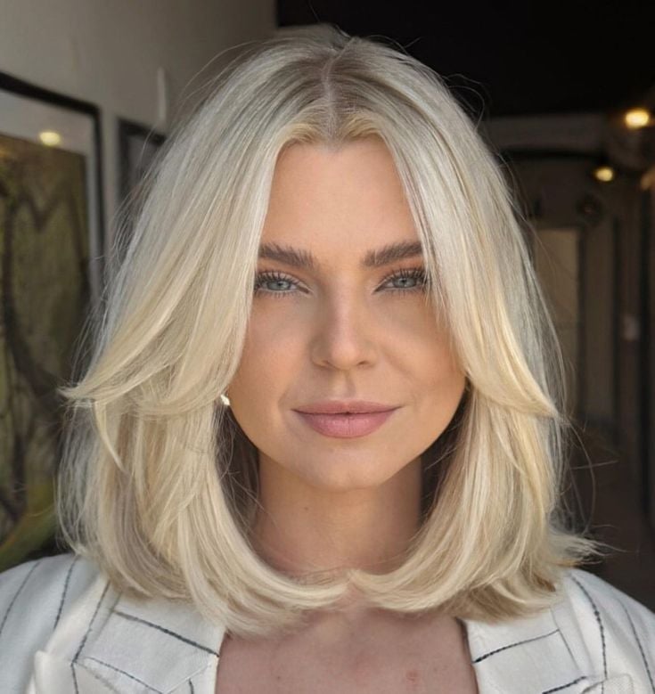 Collarbone Lob With Voluminous Curtain Bangs Collarbone Lob With Voluminous Curtain Bangs — Simple Volume Hair