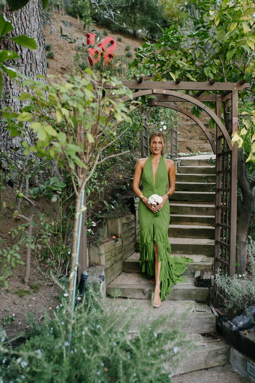 Lime green halter neck gown with tiered fringe skirt — Simple Wedding Guest Outfits
