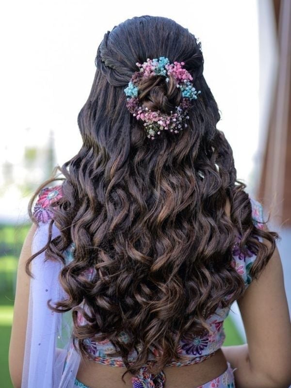 Half-Up With Braids and Floral Accessory — Simple Wedding Hairstyles for Long Hair