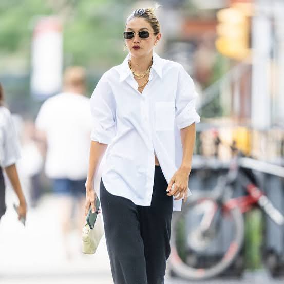 Oversized White Button-Up Shirt with Black Trousers Oversized White Button-Up Shirt with Black Trousers — Simple White Top Outfits