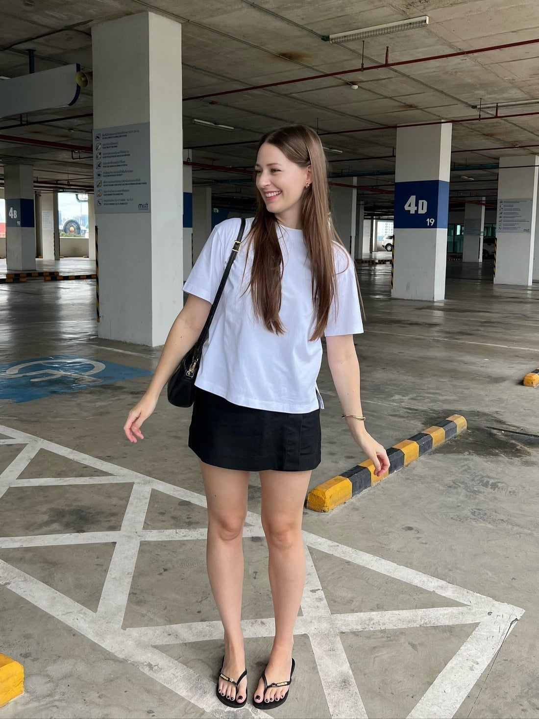 Simple White T-Shirt with Black Mini Skirt, Close-Up Take Simple White T-Shirt with Black Mini Skirt, Close-Up Take — Simple White Top Outfits