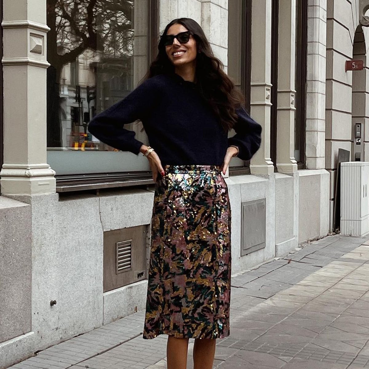 Navy Sweater Paired with a Sequined Midi Skirt Navy Sweater Paired with a Sequined Midi Skirt — Simple Work Party Outfits
