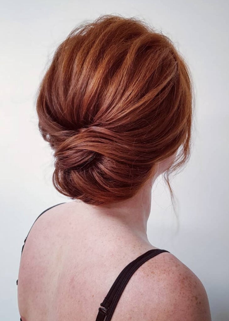 Red Low Chignon With Loose Tendrils — Simple Y2K Updo