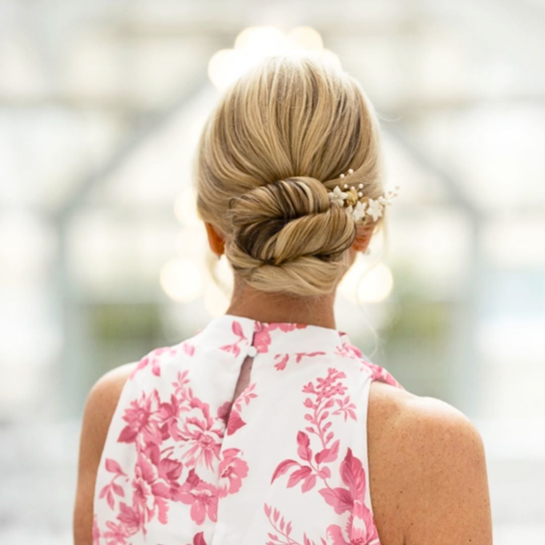 Fine Blonde Twisted Low Bun With Hair Pin — Simple Y2K Updo