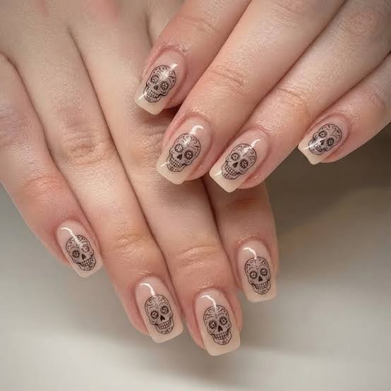 Short Almond Nude Black Skull Pattern Nails — Skull Nails
