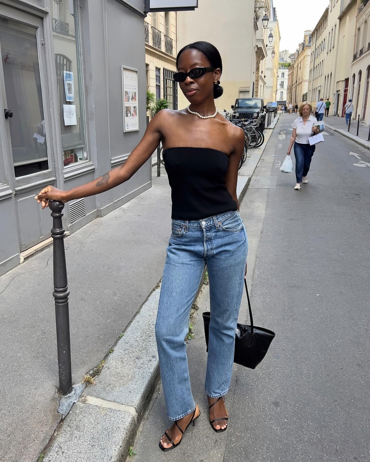 Black strapless knit top with straight leg jeans — Smart Casual Outfits