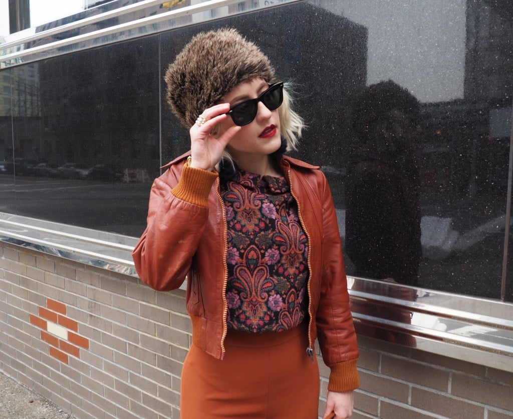 Leather Bomber Jacket Over Burnt Orange Trousers Leather Bomber Jacket Over Burnt Orange Trousers — Trendy 70s Style
