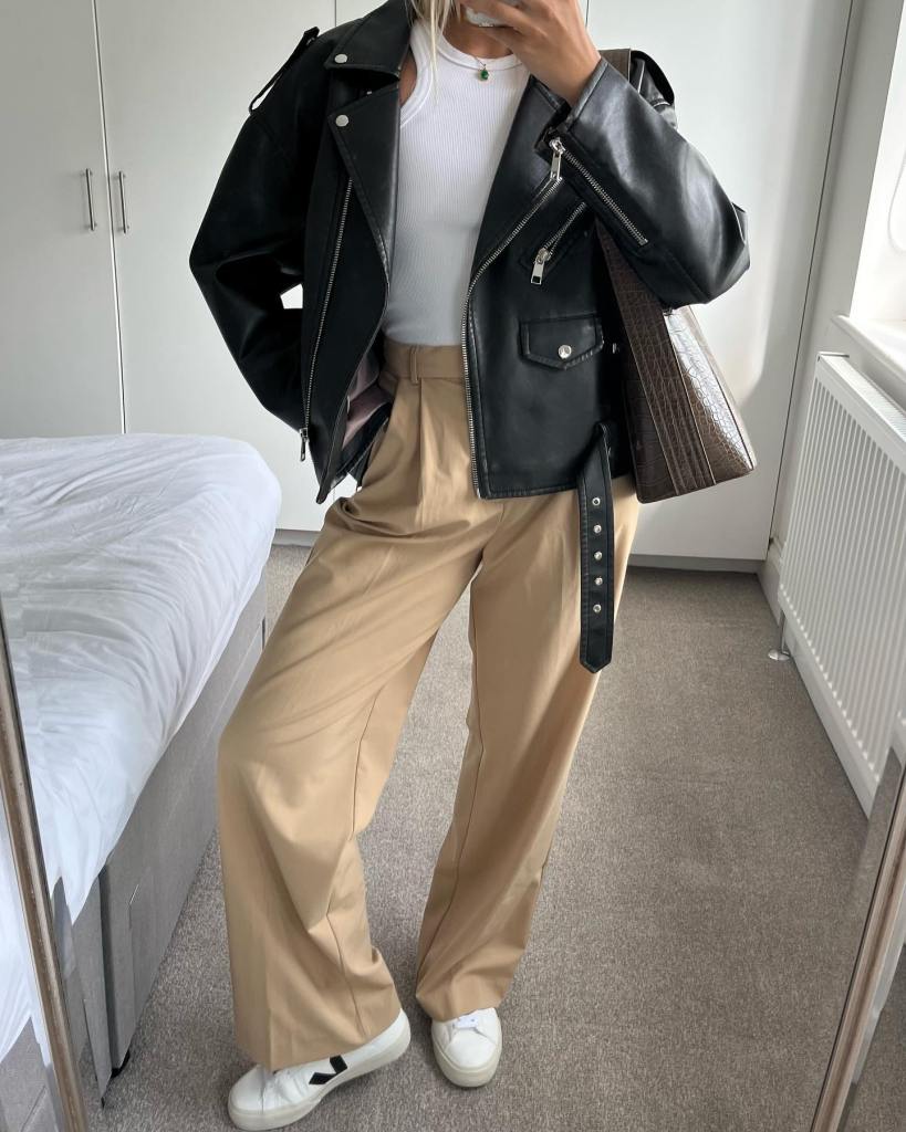 Wide-leg beige trousers with black leather jacket — Trendy Beige Outfits