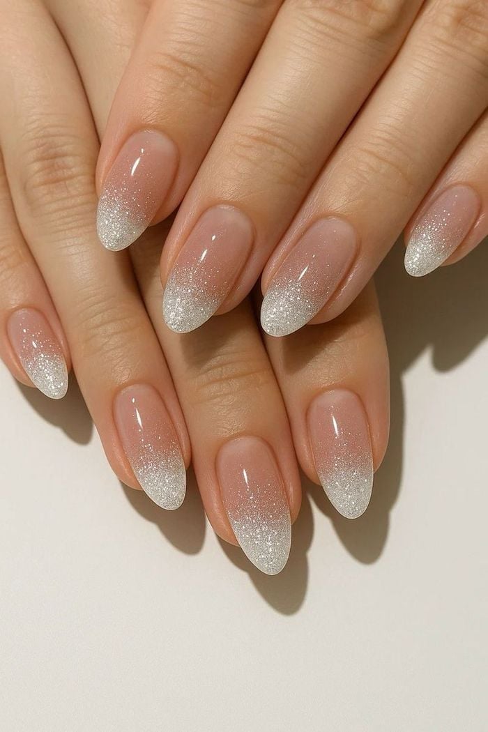 Nude Almond Nails With Silver Glitter French Tip — Trendy Bridal Nails