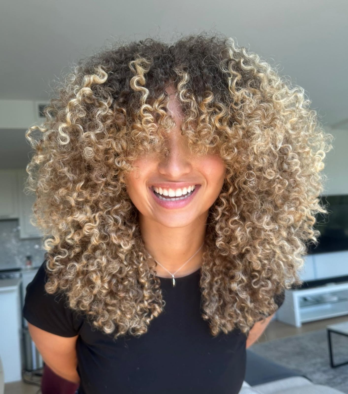 Dark Brown Hair With Blonde Balayage — Trendy Curly Hair Color
