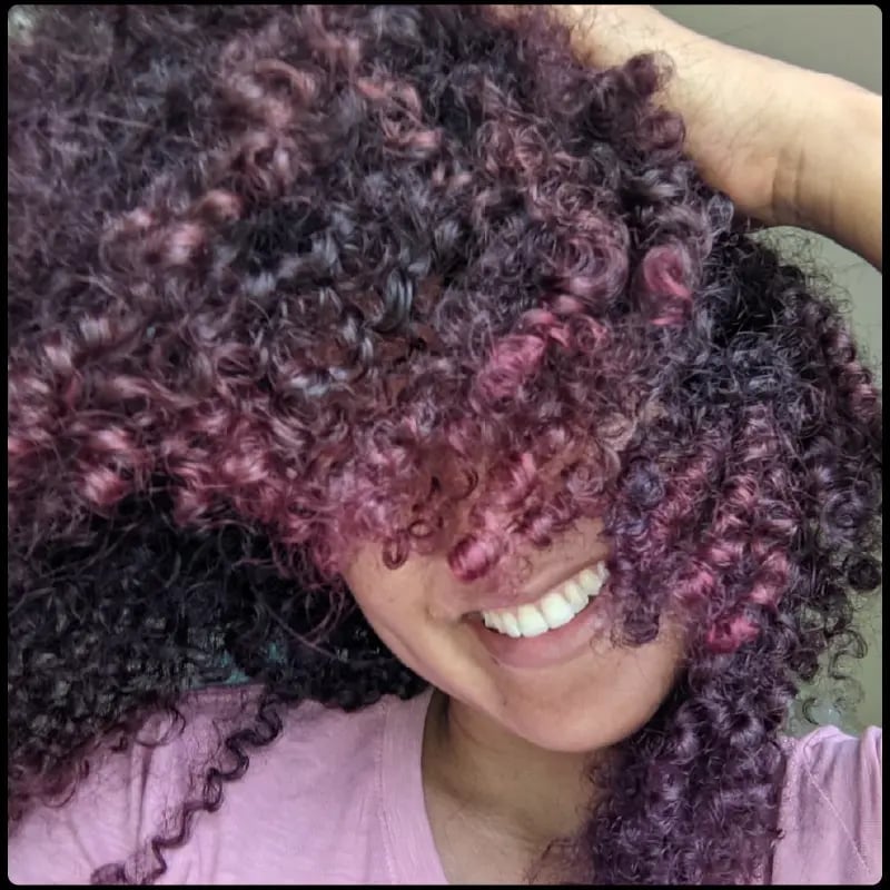 Mid-Back Dark Brown With Pink Highlights — Trendy Curly Hair Color