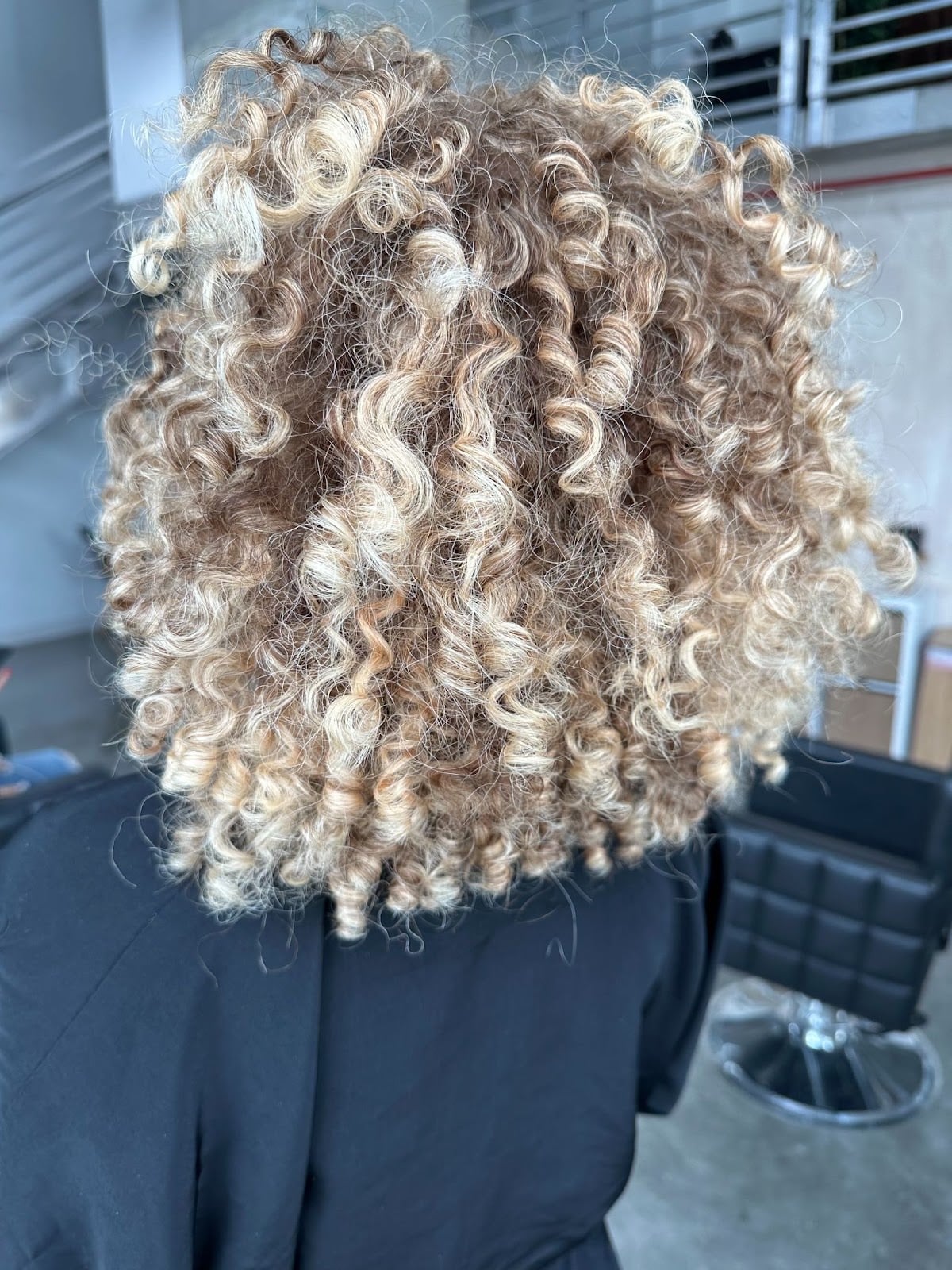Ear Length Ash Blonde With Platinum Highlights — Trendy Curly Hair Color