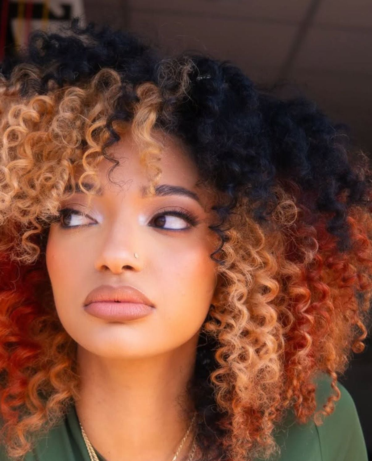 Black Base With Orange and Blonde Panels — Trendy Curly Hair Color