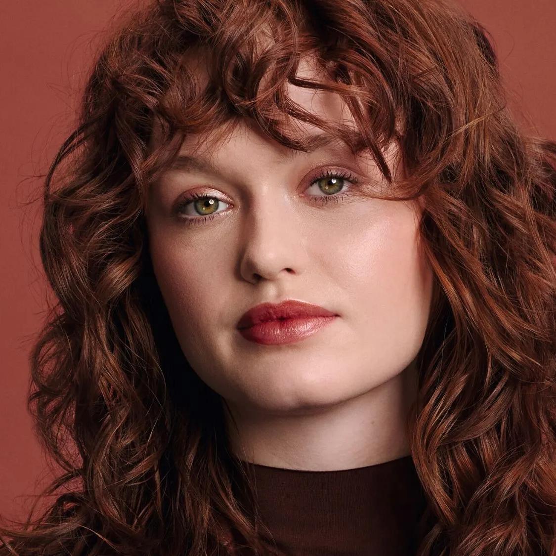Collarbone Copper Red With Blonde Highlights — Trendy Curly Hair Color