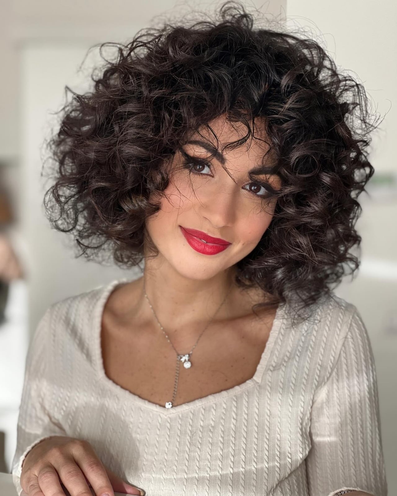 Collarbone Length Curls with Curtain Bangs Collarbone Length Curls with Curtain Bangs — Trendy Curly Hair Down