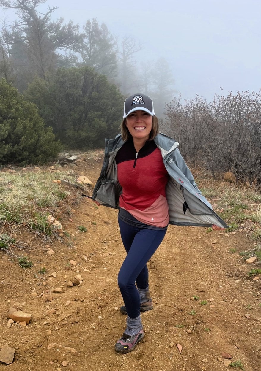 Gray Waterproof Jacket Over Red Fleece and Navy Leggings — Trendy Cute Hiking Outfit