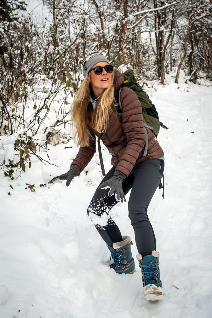 Brown Puffer Jacket with Gray Beanie in Snow — Trendy Cute Hiking Outfit