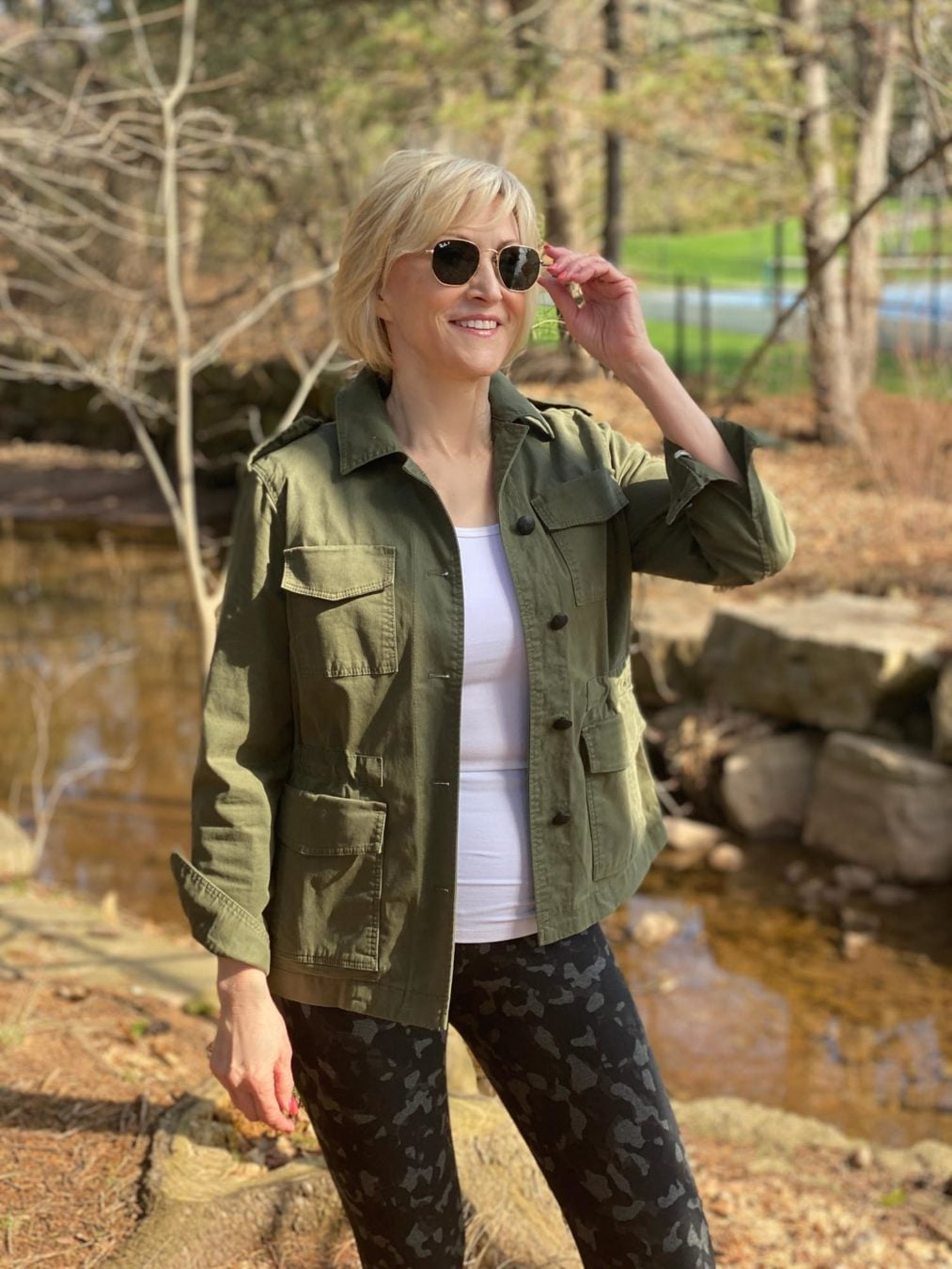 Olive Utility Jacket Over Camouflage Leggings — Trendy Cute Hiking Outfit