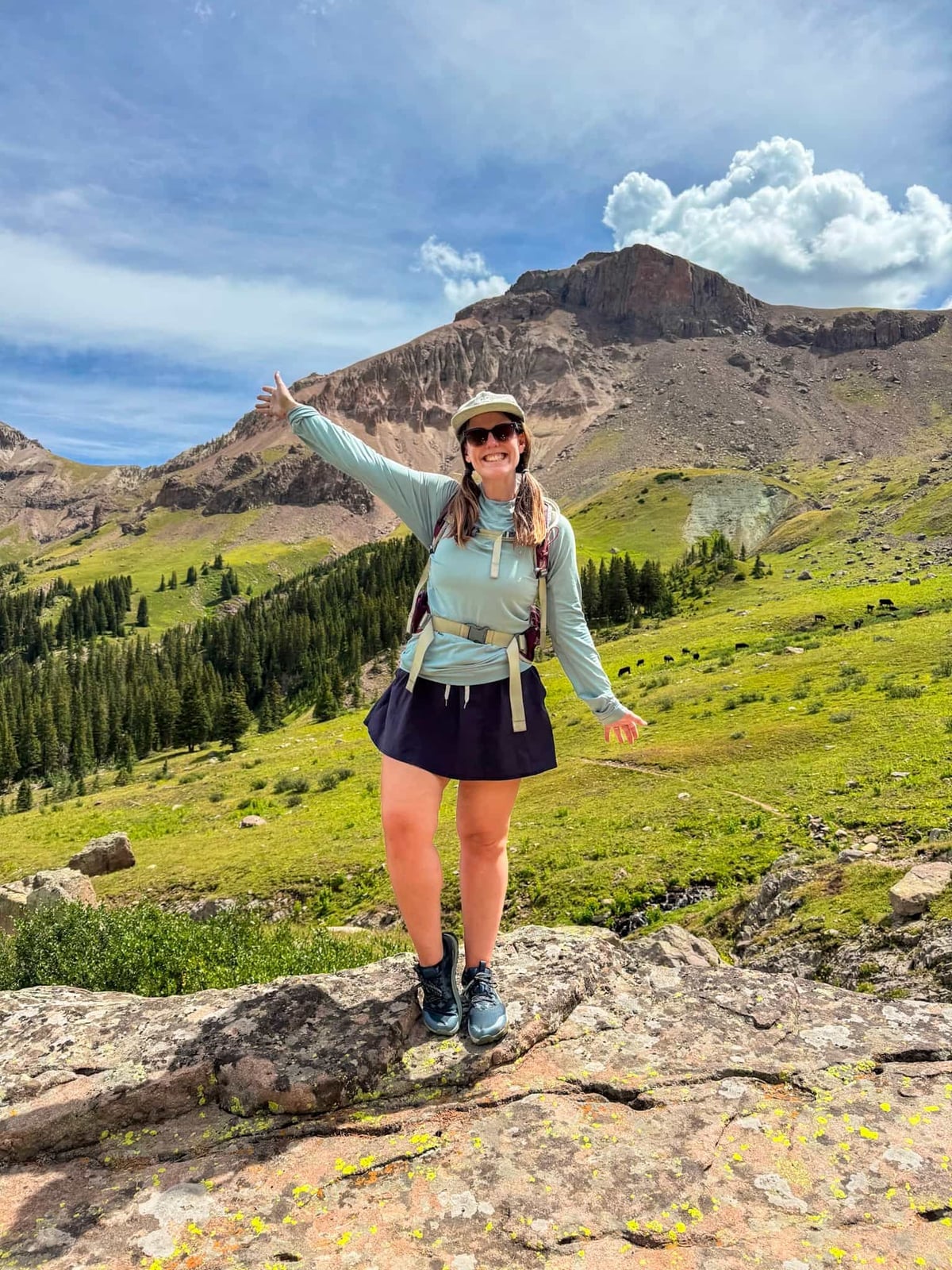 Light Green Shirt with Navy Utility Vest and A-line Skirt — Trendy Cute Hiking Outfit
