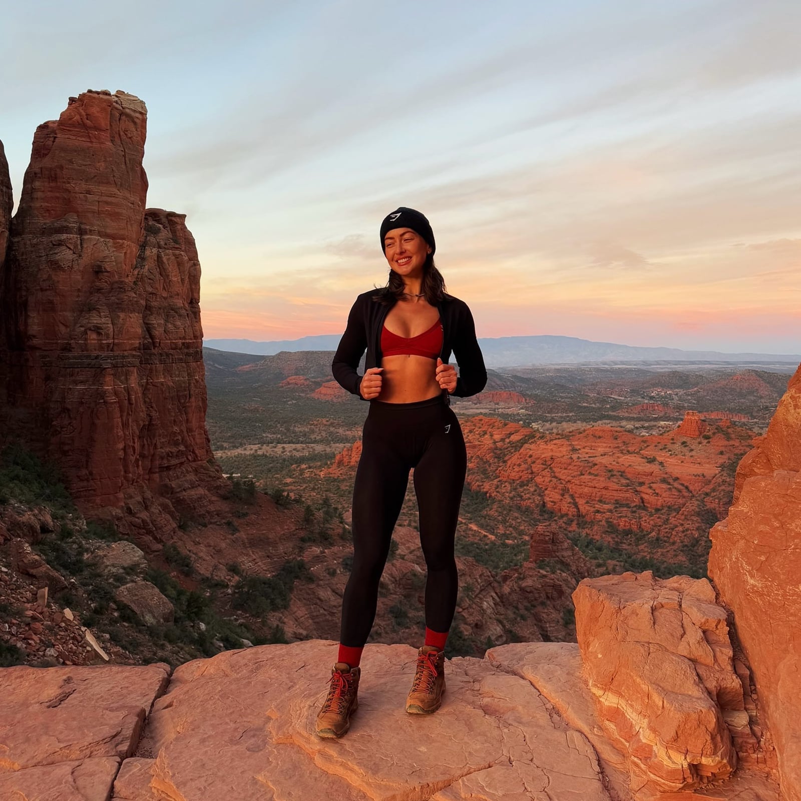 Black Leggings and Red Sports Bra with Beanie — Trendy Cute Hiking Outfit