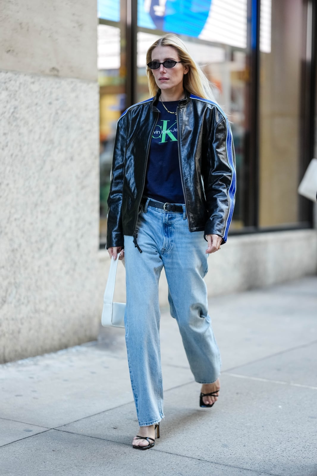 Leather Jacket over Graphic Tee with Wide Leg Jeans — Trendy Cute Jeans Outfit