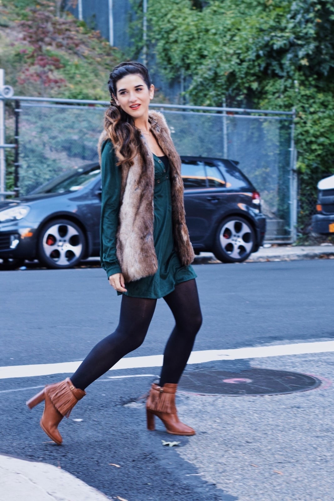 Dark green suede A-line mini dress with fur vest, Close-Up Take — Trendy Dark Green Dress
