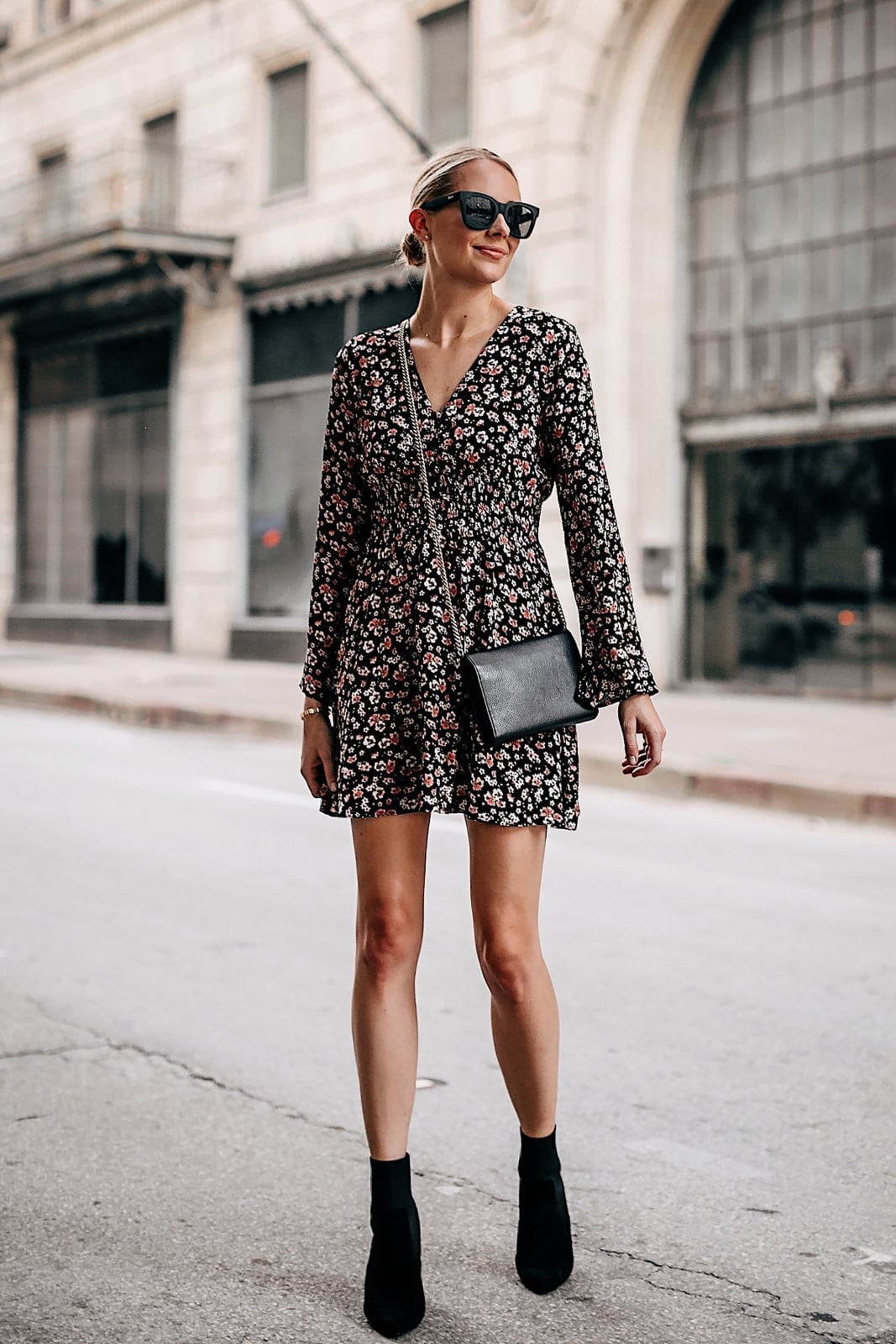 Black Floral Print Mini Dress With Bell Sleeves, Close-Up Take — Trendy Dress with Sleeves